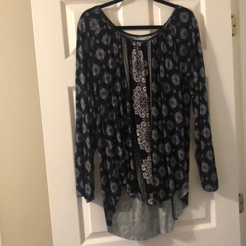 Maurice’s blue blouse